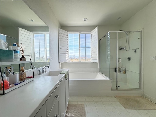 3530 E Delight Paseo Unit 205, Ontario, CA 91761 - bathroom featuring a shower stall, a garden tub, vanity, and recessed lighting
