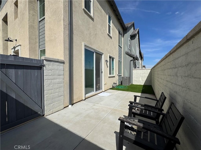 3530 E Delight Paseo Unit 205, Ontario, CA 91761 - fenced backyard featuring a patio and a gate