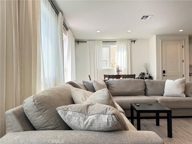3530 E Delight Paseo Unit 205, Ontario, CA 91761 - living area with wood finished floors and recessed lighting
