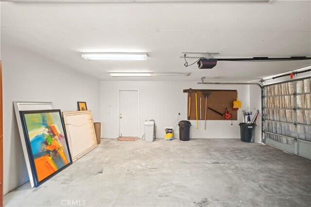 garage featuring a garage door opener