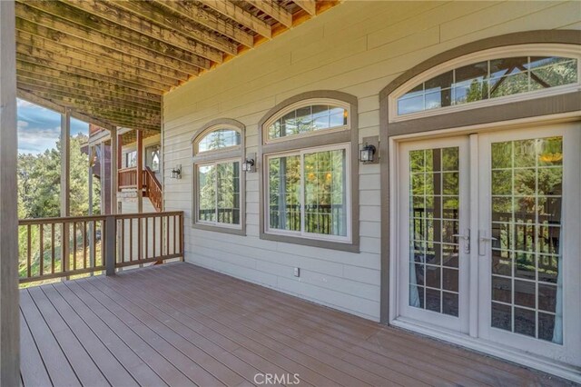 unfurnished sunroom featuring a healthy amount of sunlight
