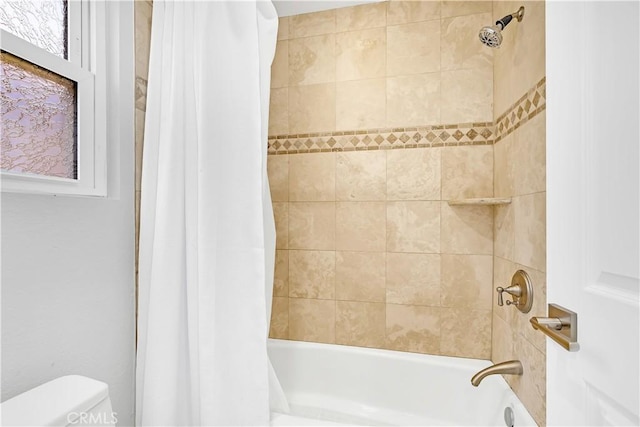 full bath with shower / bathtub combination with curtain and toilet