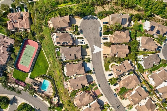 birds eye view of property with a residential view