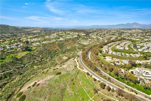 aerial view featuring a mountain view and a residential view