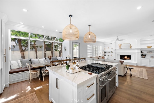 14 Belaire, Laguna Niguel, CA 92677 - kitchen with plenty of natural light, a ceiling fan, open floor plan, and range with two ovens