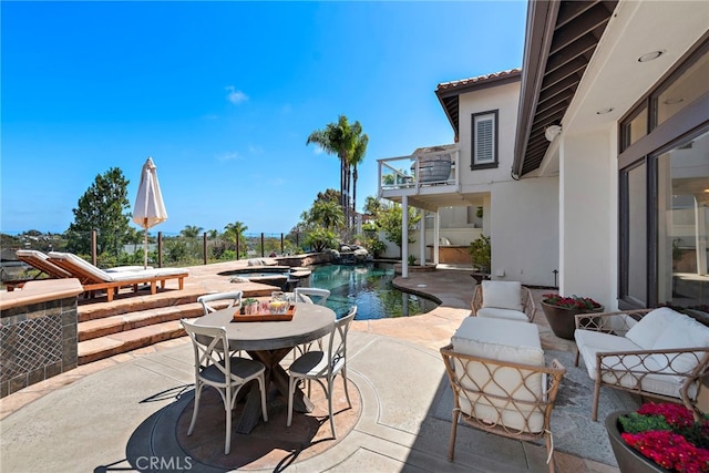 14 Belaire, Laguna Niguel, CA 92677 - view of patio / terrace featuring a pool with connected hot tub and a balcony