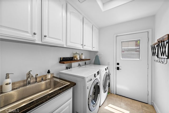 14 Belaire, Laguna Niguel, CA 92677 - washroom with a sink, cabinet space, light tile patterned flooring, and washer and dryer