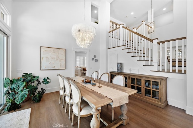14 Belaire, Laguna Niguel, CA 92677 - dining room with baseboards, a notable chandelier, and a towering ceiling