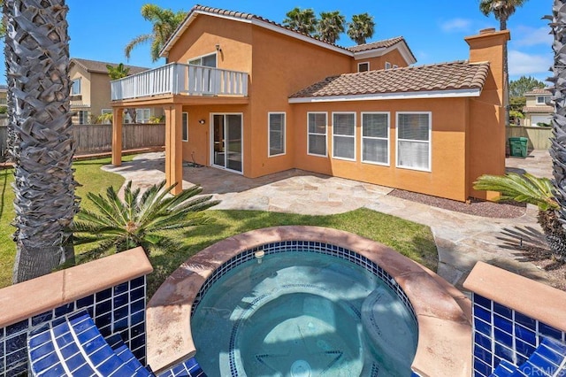 3971 Via Cangrejo, San Diego, CA 92130 - rear view of house with fence, a balcony, and stucco siding