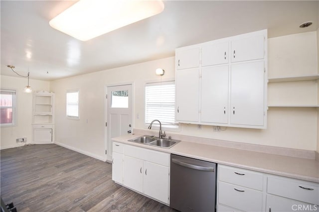 945 10th St, Huntington Beach, CA 92648 - kitchen with light countertops, white cabinetry, a sink, dark wood finished floors, and dishwasher