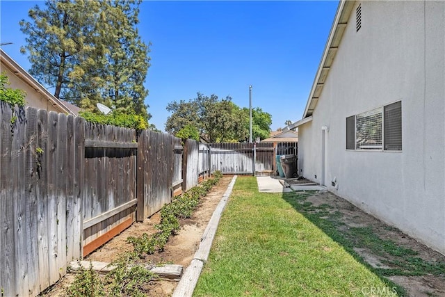 view of yard featuring a fenced backyard