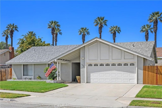 ranch-style house featuring an attached garage, a shingled roof, stucco siding, and driveway