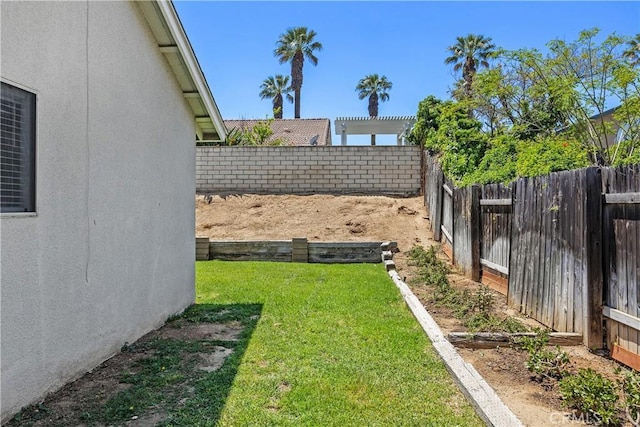 view of yard featuring a fenced backyard