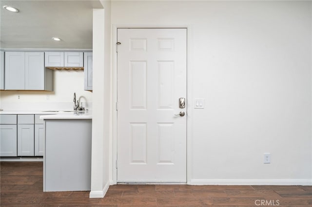 1303 Massachusetts Ave Unit 101, Riverside, CA 92507 - kitchen with recessed lighting, baseboards, light countertops, and dark wood-style flooring