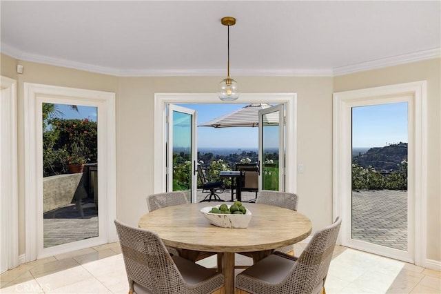6304 E E W View Dr, Orange, CA 92869 - dining space featuring healthy amount of natural light, crown molding, and light tile patterned flooring