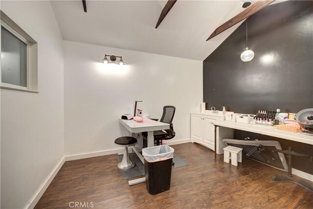 home office featuring baseboards, wood finished floors, and lofted ceiling