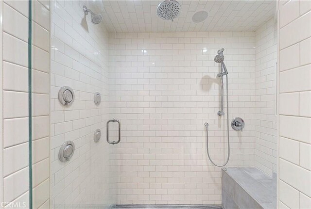 bathroom featuring a shower stall