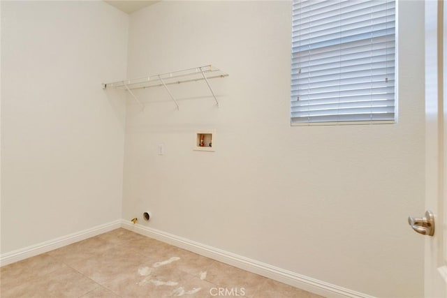 26121 Citron St, Loma Linda, CA 92354 - washroom featuring baseboards, laundry area, light tile patterned flooring, and hookup for a washing machine