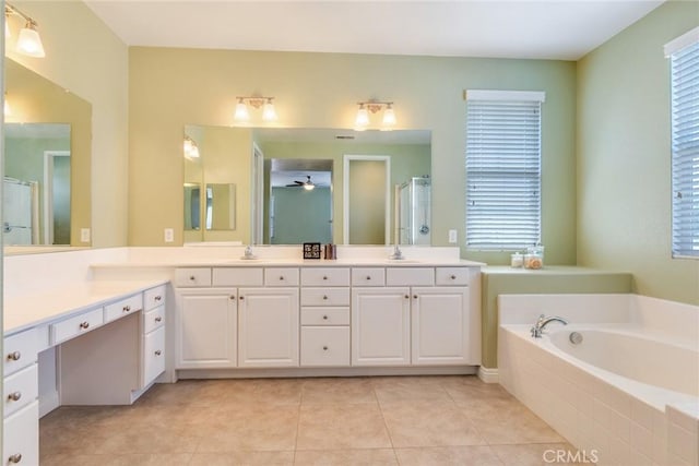 26121 Citron St, Loma Linda, CA 92354 - bathroom with a sink, a ceiling fan, a shower stall, and a garden tub