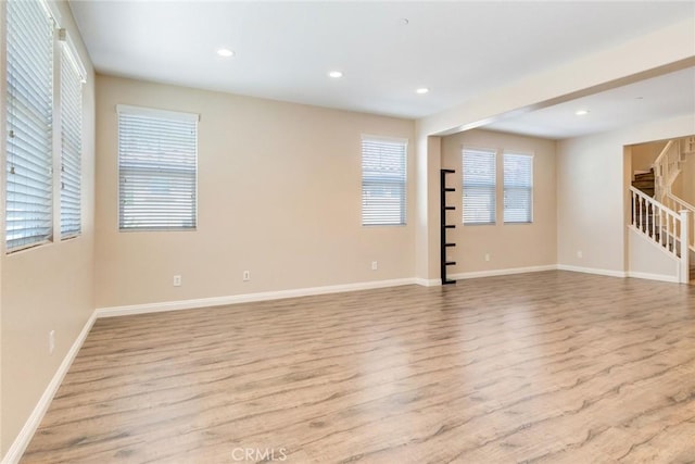 26121 Citron St, Loma Linda, CA 92354 - spare room featuring stairs, recessed lighting, and wood finished floors