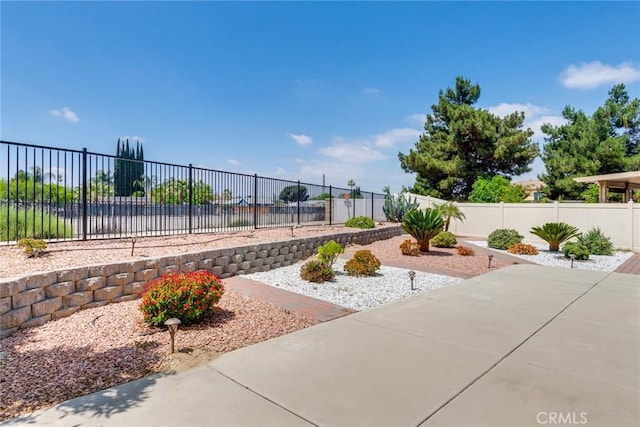 26121 Citron St, Loma Linda, CA 92354 - view of yard featuring a fenced backyard and a patio area