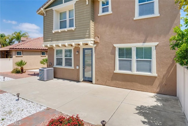 26121 Citron St, Loma Linda, CA 92354 - back of house with central AC, fence, a patio area, and stucco siding