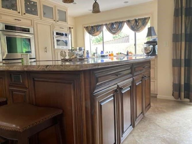 61 Paseo Esplendido, Camarillo, CA 93010 - bar with baseboards and oven