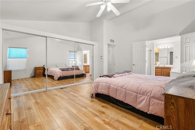 27828 Spyglass Ln, Canyon Country, CA 91351 - bedroom with a closet, light wood-style flooring, ensuite bath, and high vaulted ceiling