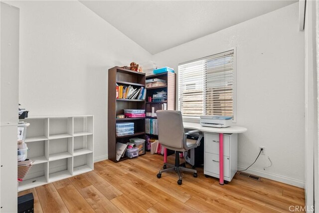 27828 Spyglass Ln, Canyon Country, CA 91351 - office with baseboards, lofted ceiling, hardwood / wood-style flooring, and visible vents