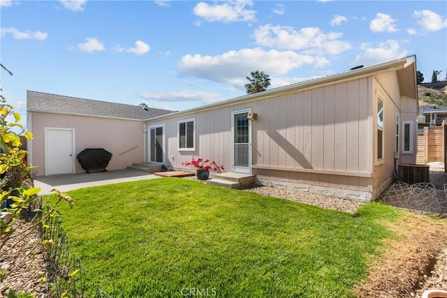 27828 Spyglass Ln, Canyon Country, CA 91351 - rear view of property featuring entry steps, a lawn, and a patio area