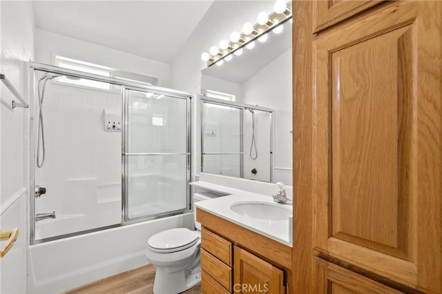 27828 Spyglass Ln, Canyon Country, CA 91351 - full bath featuring vanity, combined bath / shower with glass door, wood finished floors, and toilet