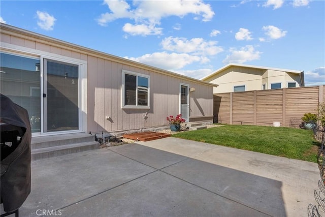 27828 Spyglass Ln, Canyon Country, CA 91351 - rear view of house with entry steps, fence, a patio, and a yard