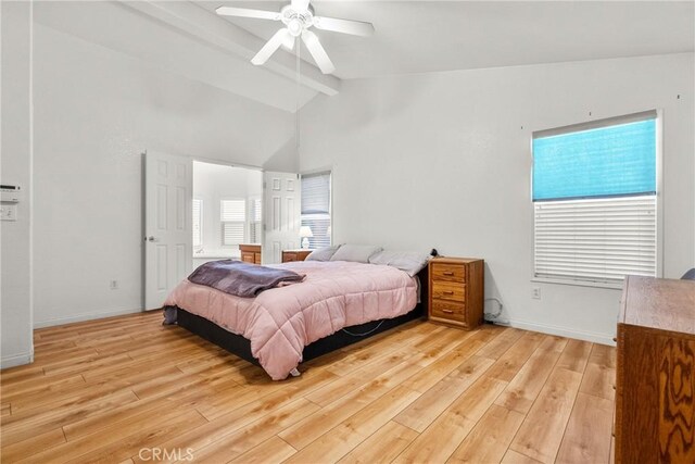 27828 Spyglass Ln, Canyon Country, CA 91351 - bedroom with vaulted ceiling with beams, a ceiling fan, baseboards, and light wood-type flooring