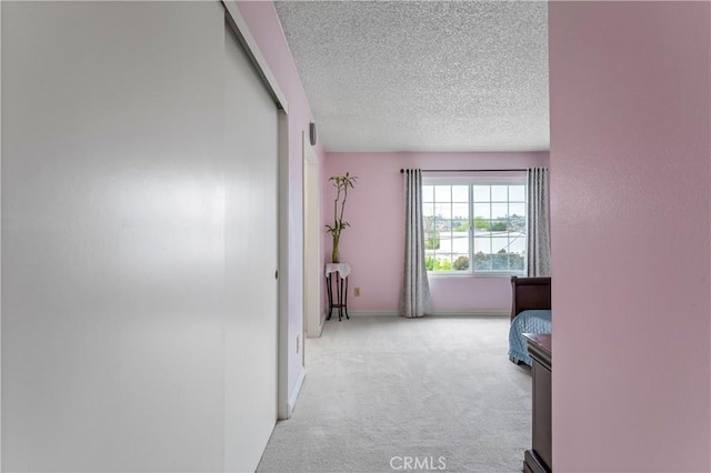 119 N Alhambra Ave Unit D, Monterey Park, CA 91755 - hallway with carpet and a textured ceiling