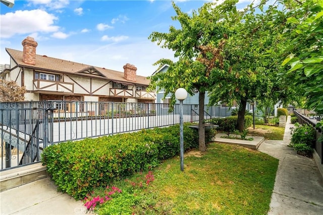 119 N Alhambra Ave Unit D, Monterey Park, CA 91755 - exterior space featuring a chimney and stucco siding