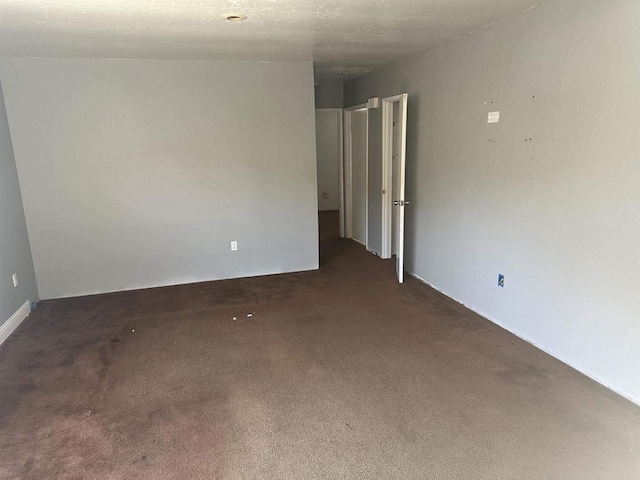 spare room with carpet floors