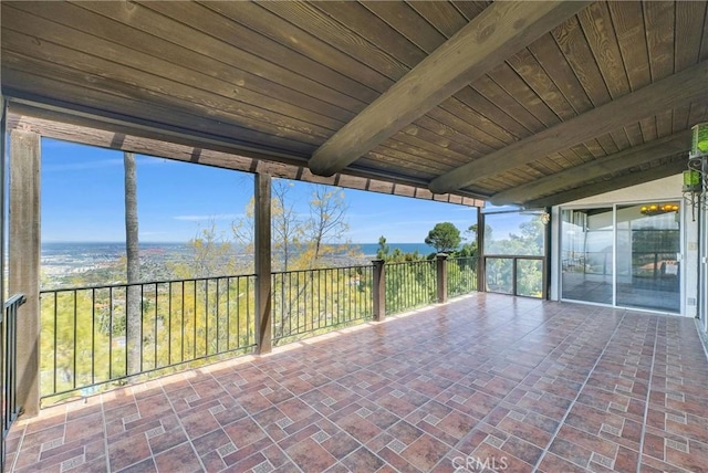30062 Grandpoint Ln, Rancho Palos Verdes, CA 90275 - unfurnished sunroom featuring brick patterned floors and wooden ceiling with exposed beams