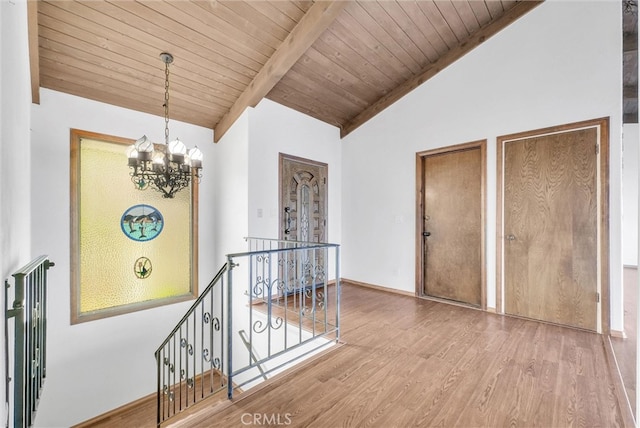 30062 Grandpoint Ln, Rancho Palos Verdes, CA 90275 - hall featuring an upstairs landing, a chandelier, wood finished floors, wooden ceiling, and baseboards
