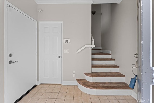 15427 Park Point Ave Unit 110, Lake Elsinore, CA 92532 - foyer with light tile patterned floors, stairway, and baseboards
