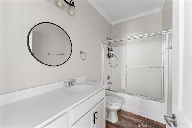 15427 Park Point Ave Unit 110, Lake Elsinore, CA 92532 - full bath with ornamental molding, vanity, toilet, wood finished floors, and combined bath / shower with glass door
