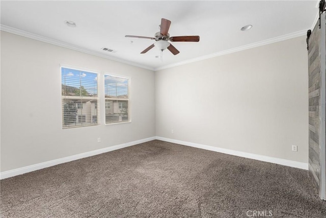 15427 Park Point Ave Unit 110, Lake Elsinore, CA 92532 - carpeted spare room featuring a barn door, a ceiling fan, crown molding, baseboards, and recessed lighting