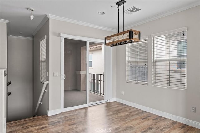 15427 Park Point Ave Unit 110, Lake Elsinore, CA 92532 - empty room with crown molding, wood finished floors, and baseboards
