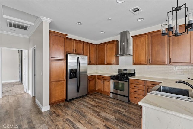 15427 Park Point Ave Unit 110, Lake Elsinore, CA 92532 - kitchen featuring stainless steel appliances, wall chimney range hood, a sink, tasteful backsplash, and dark wood finished floors