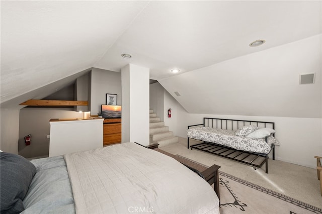 carpeted bedroom with visible vents, recessed lighting, and lofted ceiling