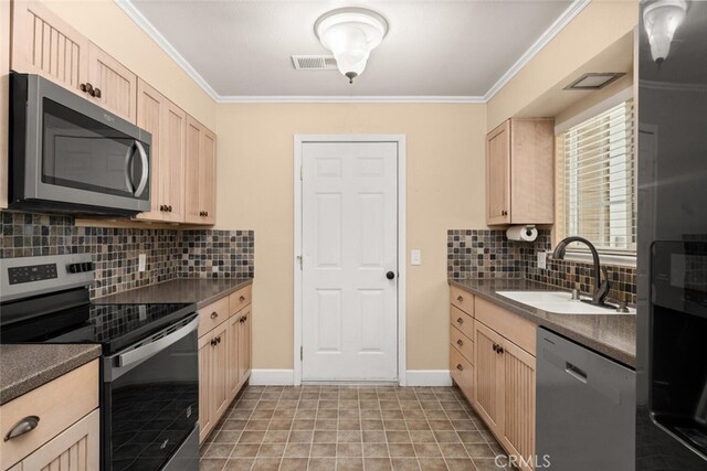 9137 Midway, Durham, CA 95938 - kitchen with light brown cabinetry, crown molding, appliances with stainless steel finishes, and a sink