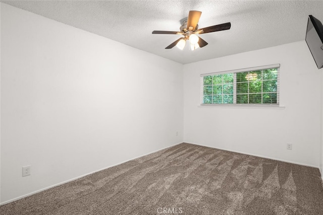 9137 Midway, Durham, CA 95938 - carpeted empty room with a ceiling fan and a textured ceiling