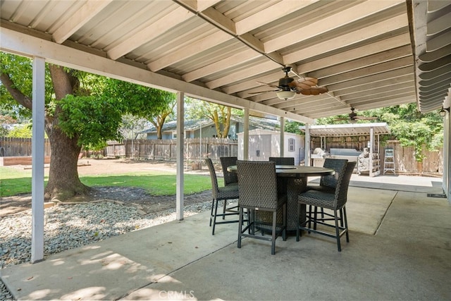 9137 Midway, Durham, CA 95938 - view of patio / terrace featuring an outdoor structure, a fenced backyard, ceiling fan, and a shed