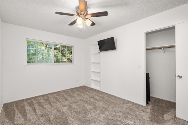 9137 Midway, Durham, CA 95938 - unfurnished bedroom with carpet floors, a ceiling fan, a textured ceiling, and baseboards