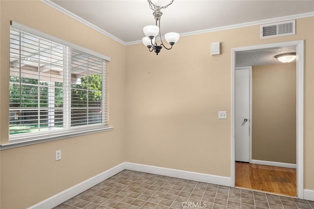 9137 Midway, Durham, CA 95938 - spare room featuring an inviting chandelier, baseboards, crown molding, and visible vents