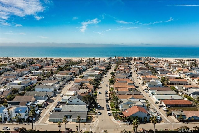 birds eye view of property featuring a residential view and a water view